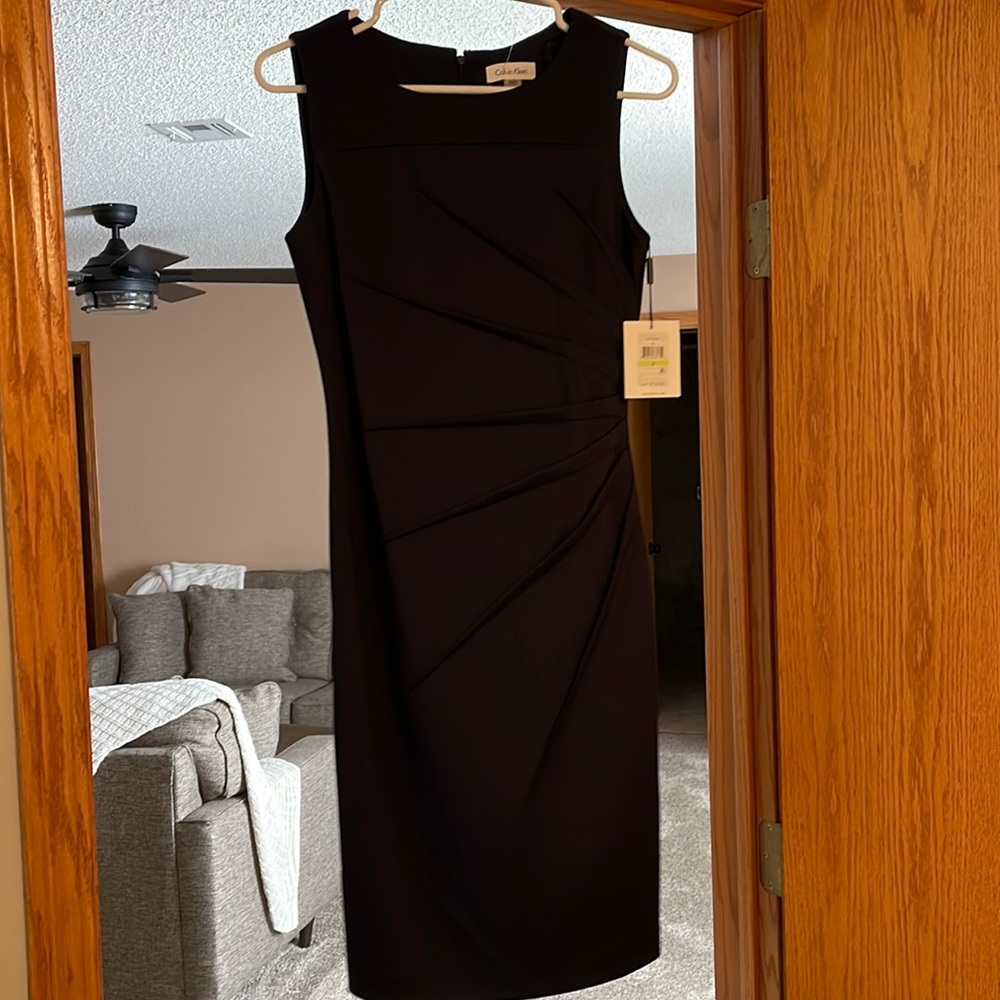This dress is timeless, navy fitted Calvin Klein size 4